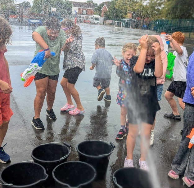 Children having fun in wet wednesday activities