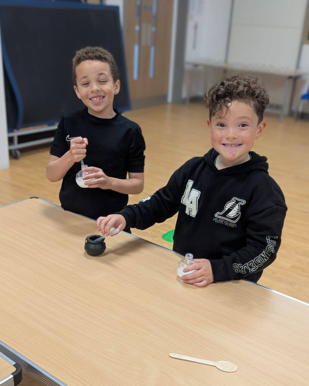 Children creating spooky Halloween potions